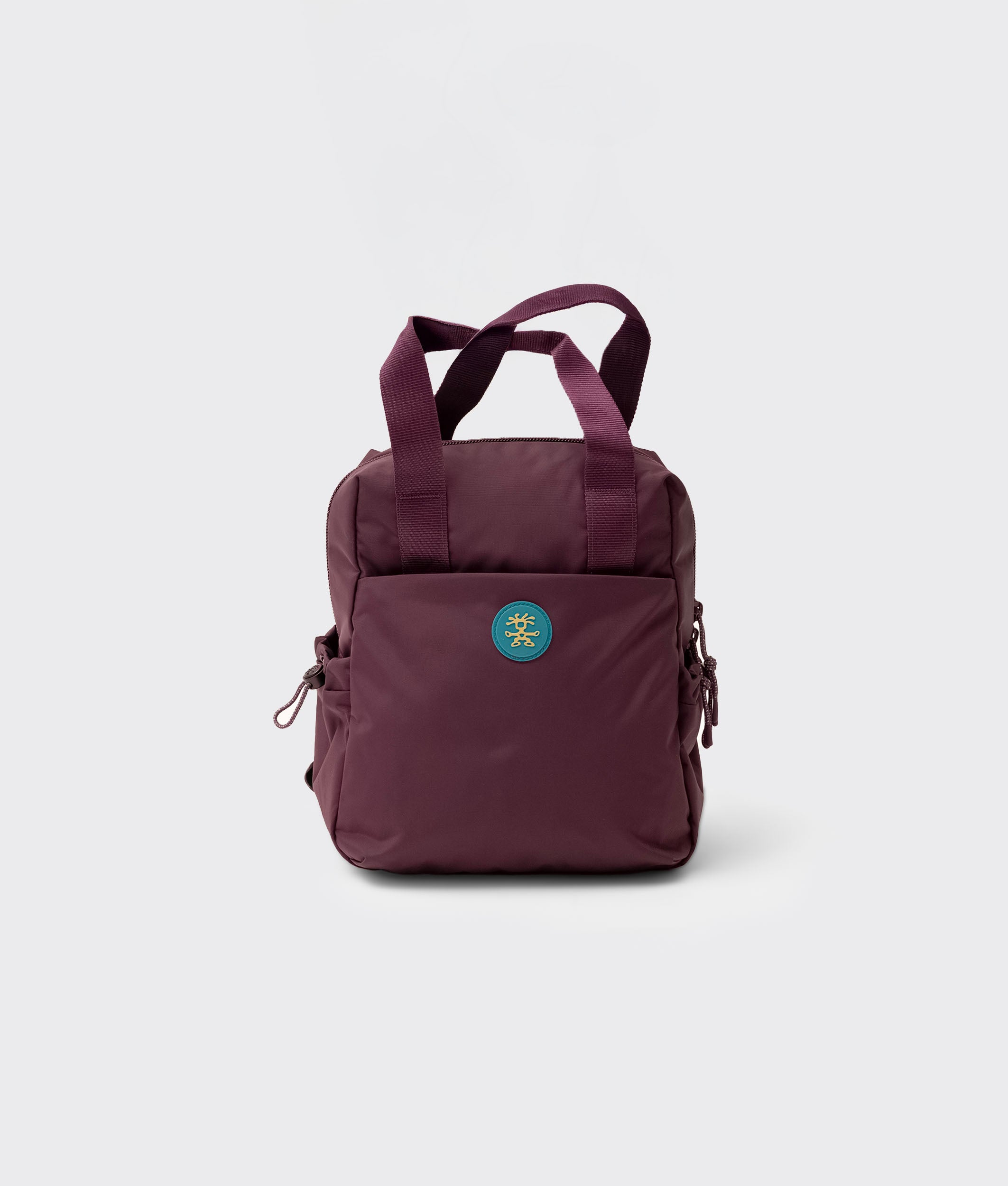 【CRUMPLER】緑と紫のドット柄バックパック crumpler-froglet-small-acai-5.